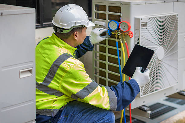 Professional Air Conditioning Repair technician working in Peotone, IL